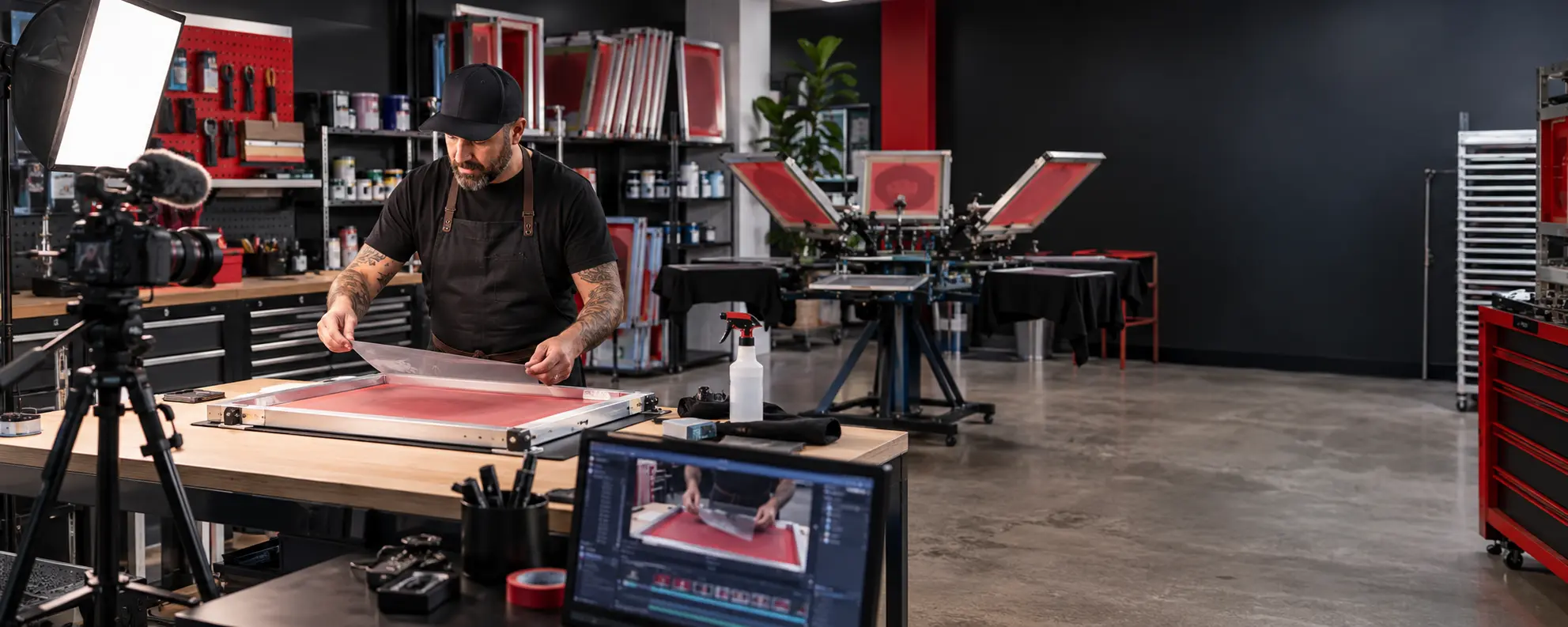 Screen-printing instructor recording a practical training tutorial